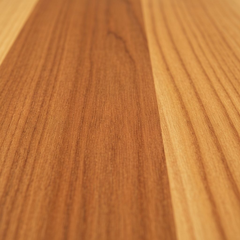 Close-up of natural Australian hardwood timber grain — the foundation of quality carpentry